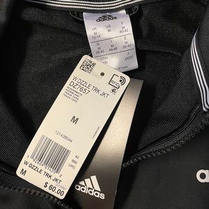 Adidas women’s warm up jacket.